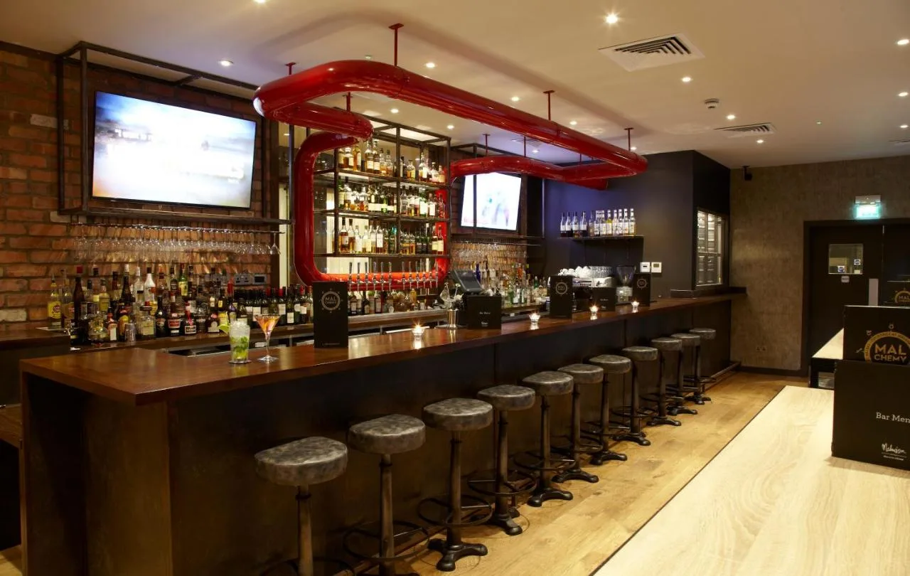 Bar stools lining the counter at Malmaison Glasgow, Glasgow city centre