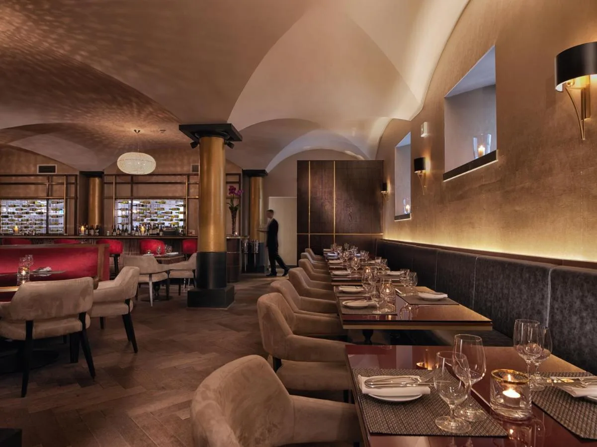 Long dining tables in the brasserie at Malmaison Glasgow, near George Square